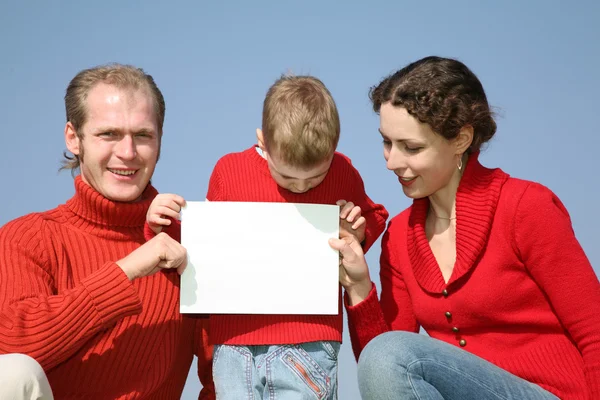 Family with card for text — Stock Photo, Image
