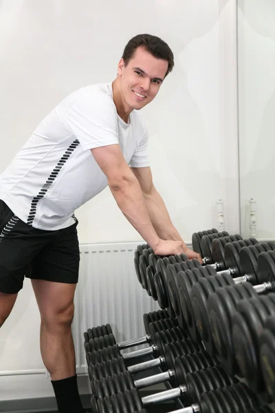 Gym man with dumbbell — Stock Photo, Image
