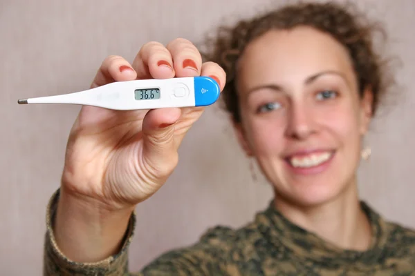 Woman with thermometer — Stock Photo, Image