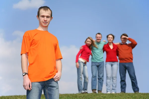 Boy and group of friends — Stock Photo, Image
