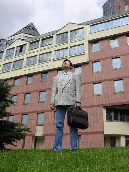 Homem de negócios edifício — Fotografia de Stock