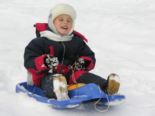 Child on sled — Stock Photo, Image