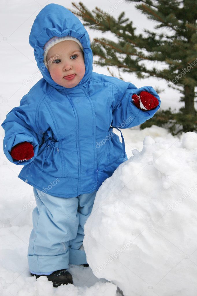 Baby with snowball