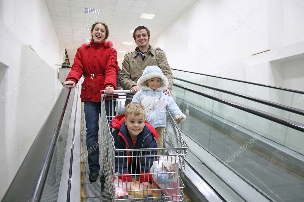 Family on shop elevator