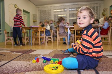 Child play in kindergarten clipart