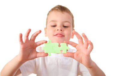 Child with puzzle 2 clipart