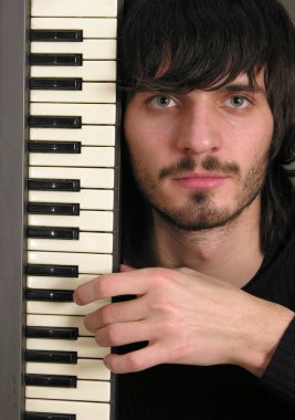 Musician with keyboard clipart