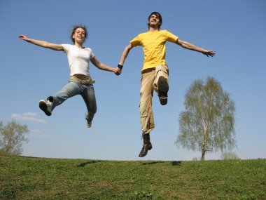 Jumping couple. spring