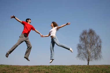 Jumping couple. spring. clipart