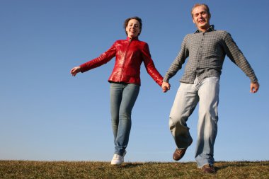 Running couple with natural light clipart