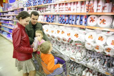 Family in houseware shop clipart