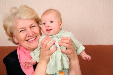 Grandmother with baby clipart