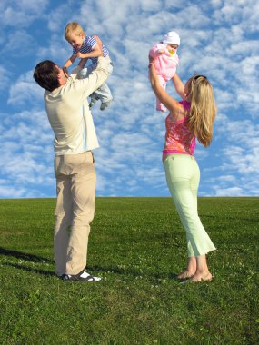 Family with two children and cloudfield clipart