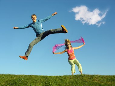 Couple jump under cloud clipart