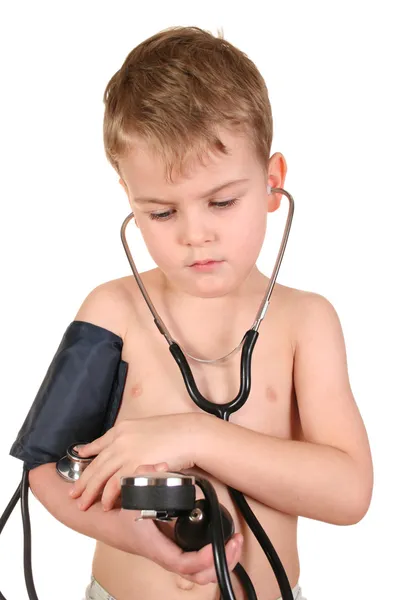 Criança com esfigmomanômetro — Fotografia de Stock