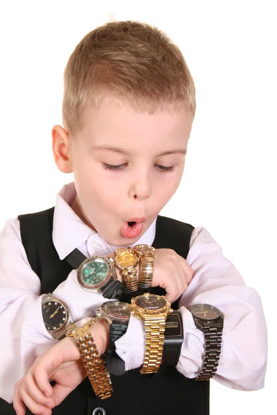Jongen met vele klokken — Stockfoto
