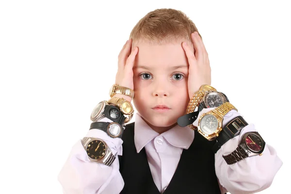 Trieste jongen met klokken — Stockfoto
