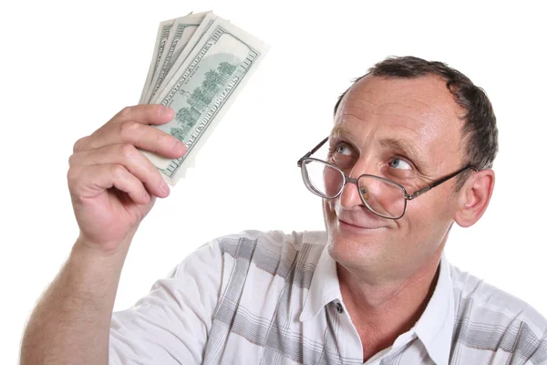 Пенсионер с деньгами — стоковое фото