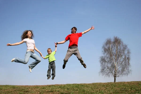 Jumping family. spring. — Stock Photo, Image