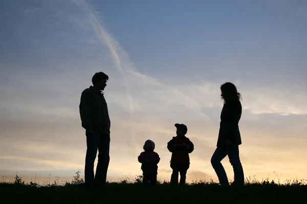Silhouette family of four — Stock Photo, Image