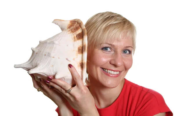Pretty woman with seashell — Stock Photo, Image