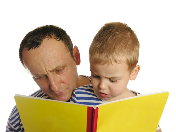 Abuelo con nieto leer libro —  Fotos de Stock