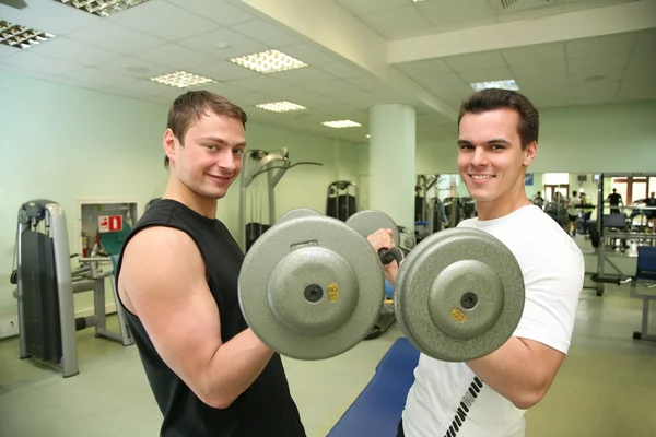 Gym boys with dumbbells — Stock Photo, Image