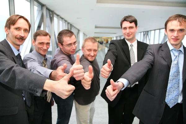 Businessteam met vingers ok — Stockfoto