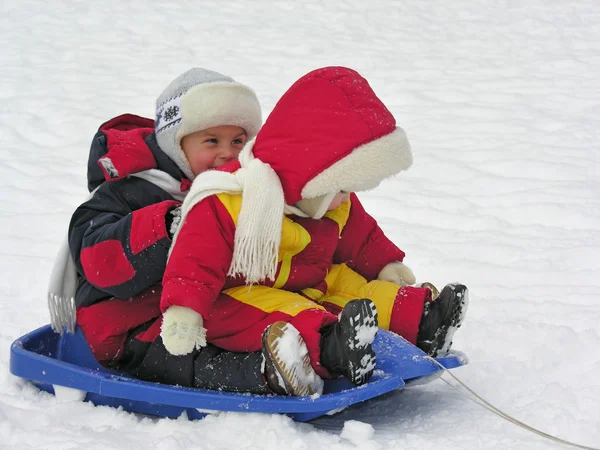 Children on sled — Stock Photo, Image