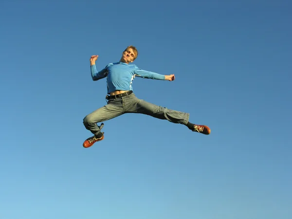 Man fly on blue sky — Stock Photo, Image