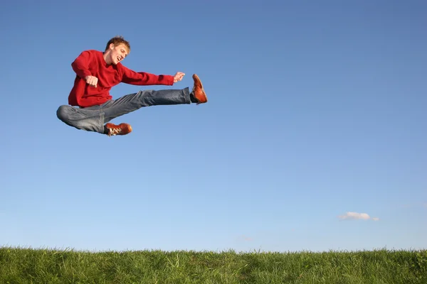 Прыжок фигурного человека — стоковое фото