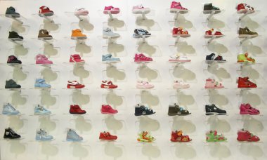 Child shoes in shop clipart