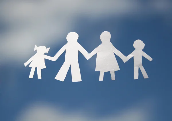 Paper family on sky — Stock Photo, Image