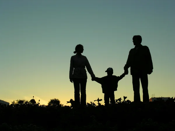 Família com menino pôr-do-sol 2 — Fotografia de Stock