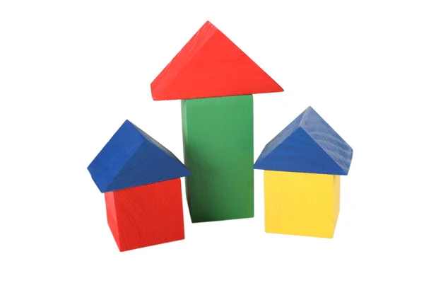 Three wood toy houses — Stock Photo, Image