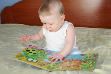 Baby with boock clipart