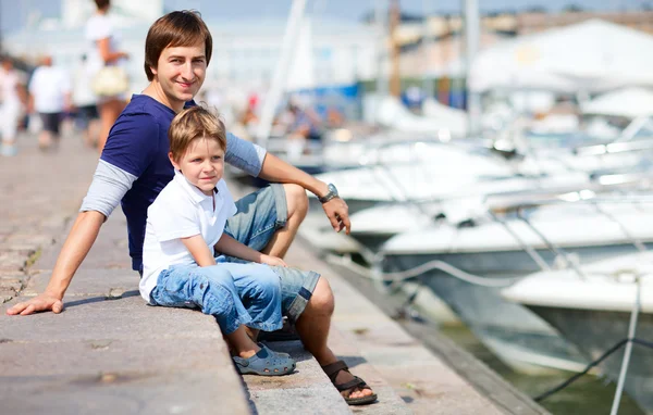Father and son at marina in city center — Stock Photo, Image