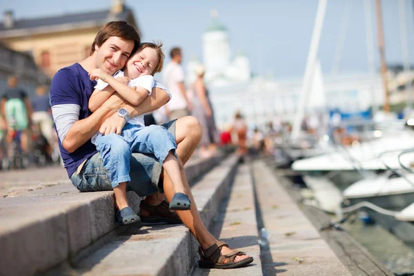 Happy father and son outdoors in city center — Stock Photo, Image