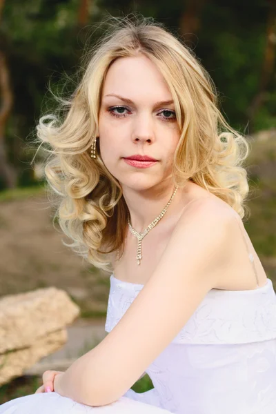 stock image Young fair-woman in white wedding dress