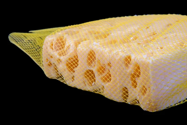 Fatia de queijo na rede — Fotografia de Stock