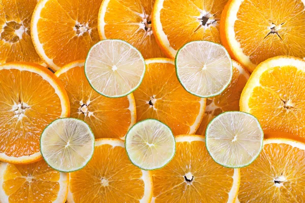 Plasterki limonki i pomarańczy — Zdjęcie stockowe