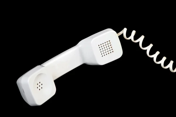 Белый телефон изолирован на черный — стоковое фото