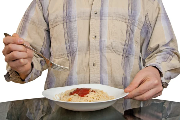 Ludzkie ręce z widelcem i spaghetti — Zdjęcie stockowe