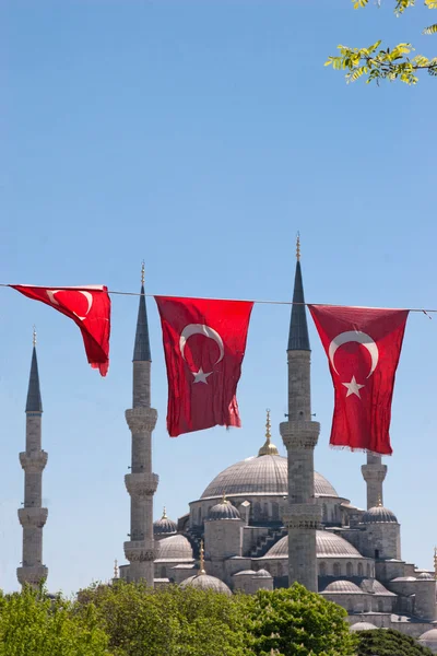 stock image Mosque behind turkish flags