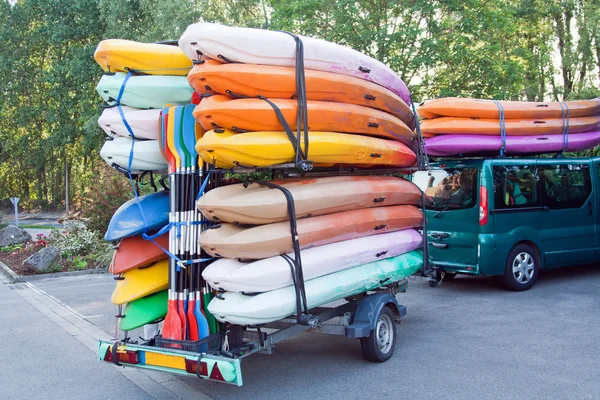 Trailer with kayaks and paddles — Stock Photo, Image