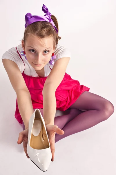 Girl with shoe — Stock Photo, Image