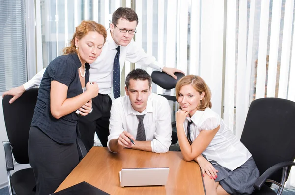 Manager with office workers on meeting in board room — Stock Photo, Image