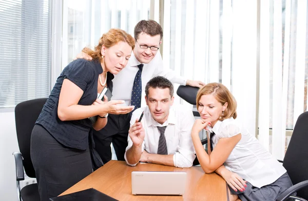 Manager with office workers on meeting — Stock Photo, Image