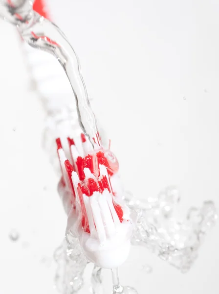 stock image Toothbrush in a water splash