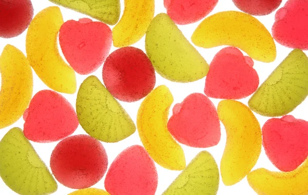 Caramelos de frutas sobre fondo blanco . — Foto de Stock